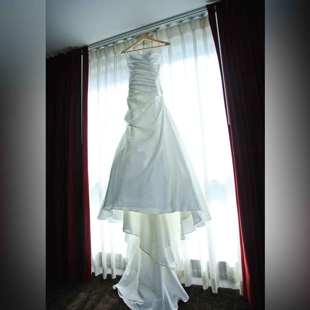 Beautiful wedding dress by Exclusive Bridals by A.C.E in size 6